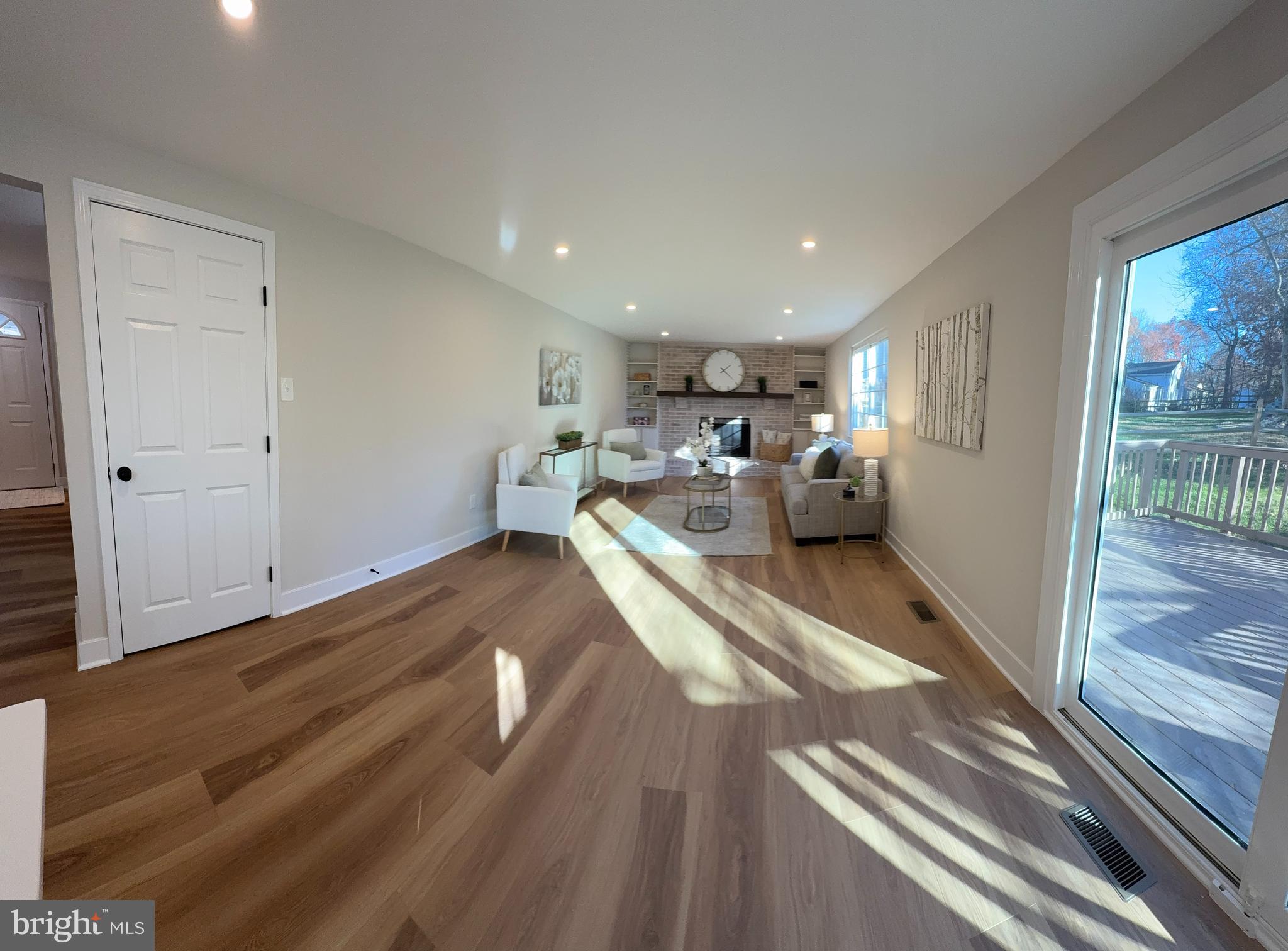 8375 Magic Leaf Road Springfield, VA 22153 - Photo 9 of 43 a view of kitchen and center island wooden floor