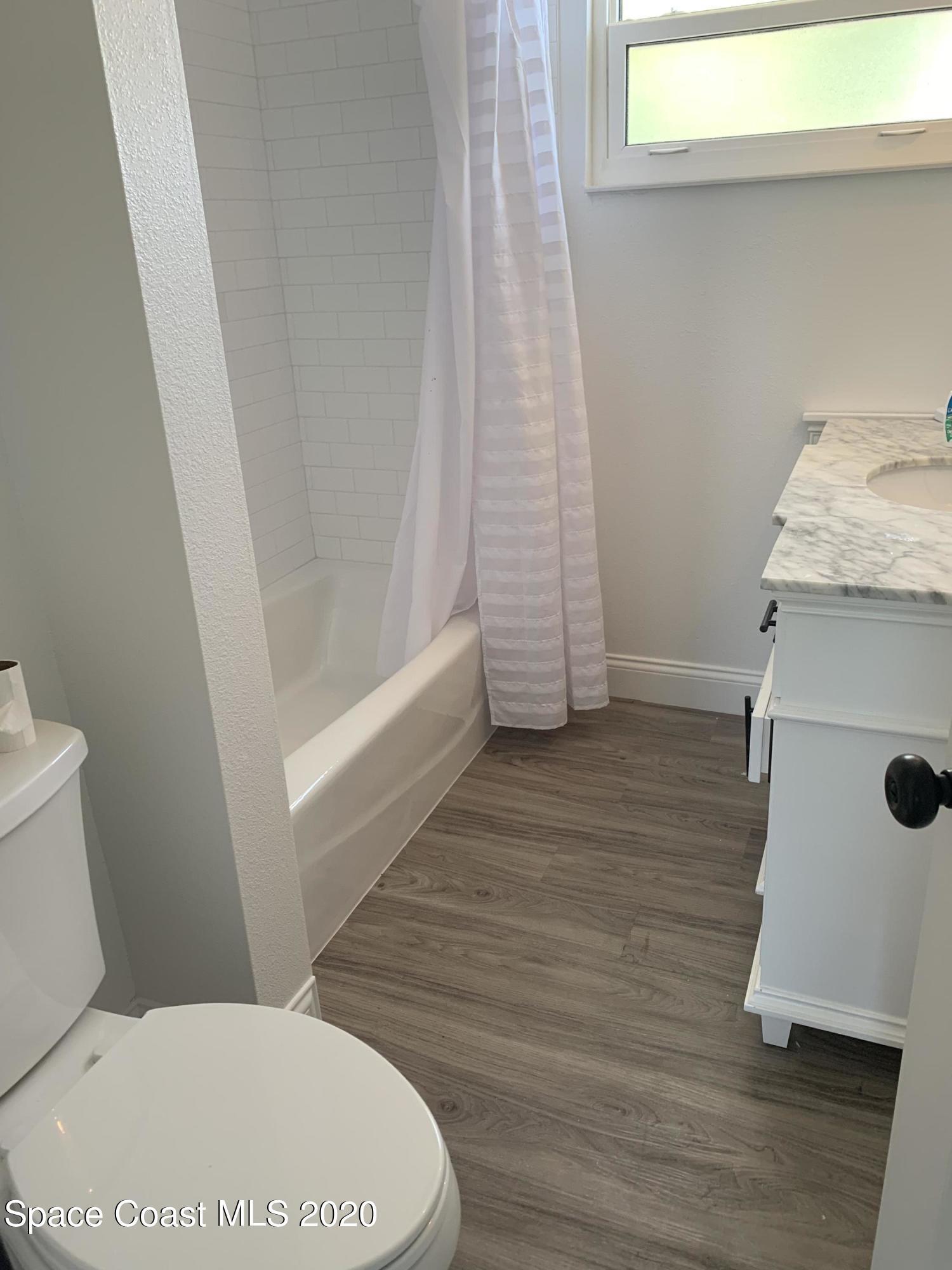 120 Maple Drive Satellite Beach, FL 32937 - Photo 12 of 13 a bathroom with a sink and a toilet