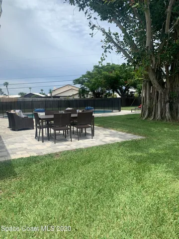 a view of a garden and patio