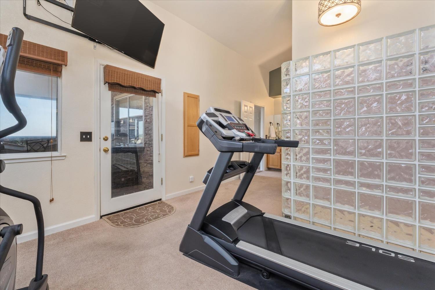 4480 Foster Court Murphys, CA 95247 - Photo 28 of 57 Primary bathroom with space for exercise equipment.