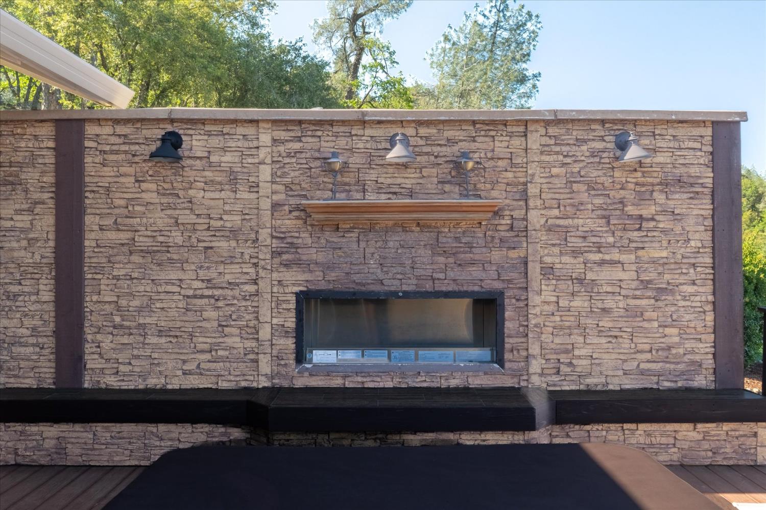 4480 Foster Court Murphys, CA 95247 - Photo 38 of 57 Fire/water privacy wall installed August 2016 with lights and hidden accent lighting.