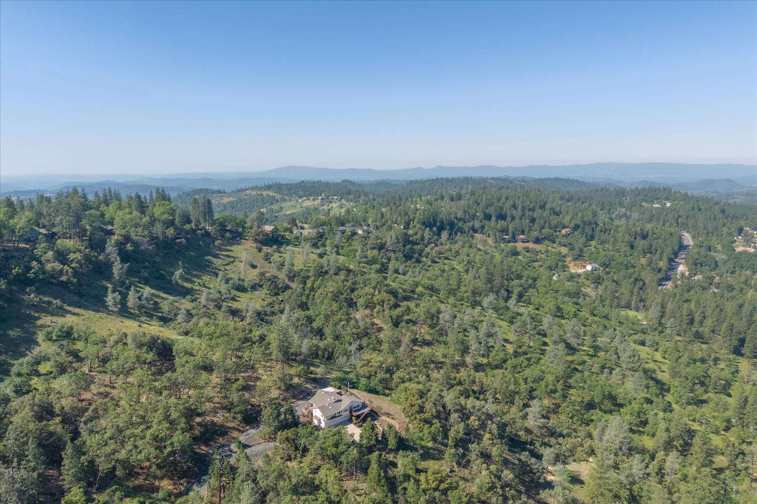 4480 Foster Court Murphys, CA 95247 - Photo 43 of 57 Privacy, panoramic views, and a property engineered to perform. Welcome to 4480 Foster Court, where 11.77 acres of Sierra Foothills serenity meet a home built for real living.