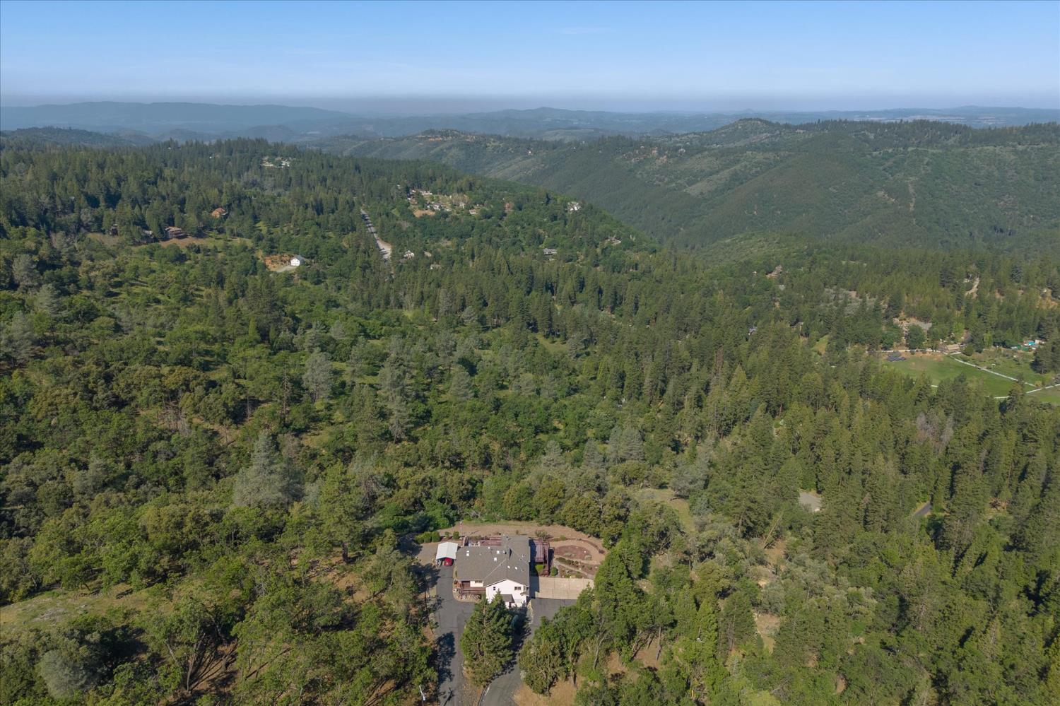 4480 Foster Court Murphys, CA 95247 - Photo 44 of 57 Privacy, panoramic views, and a property engineered to perform. Welcome to 4480 Foster Court, where 11.77 acres of Sierra Foothills serenity meet a home built for real living.