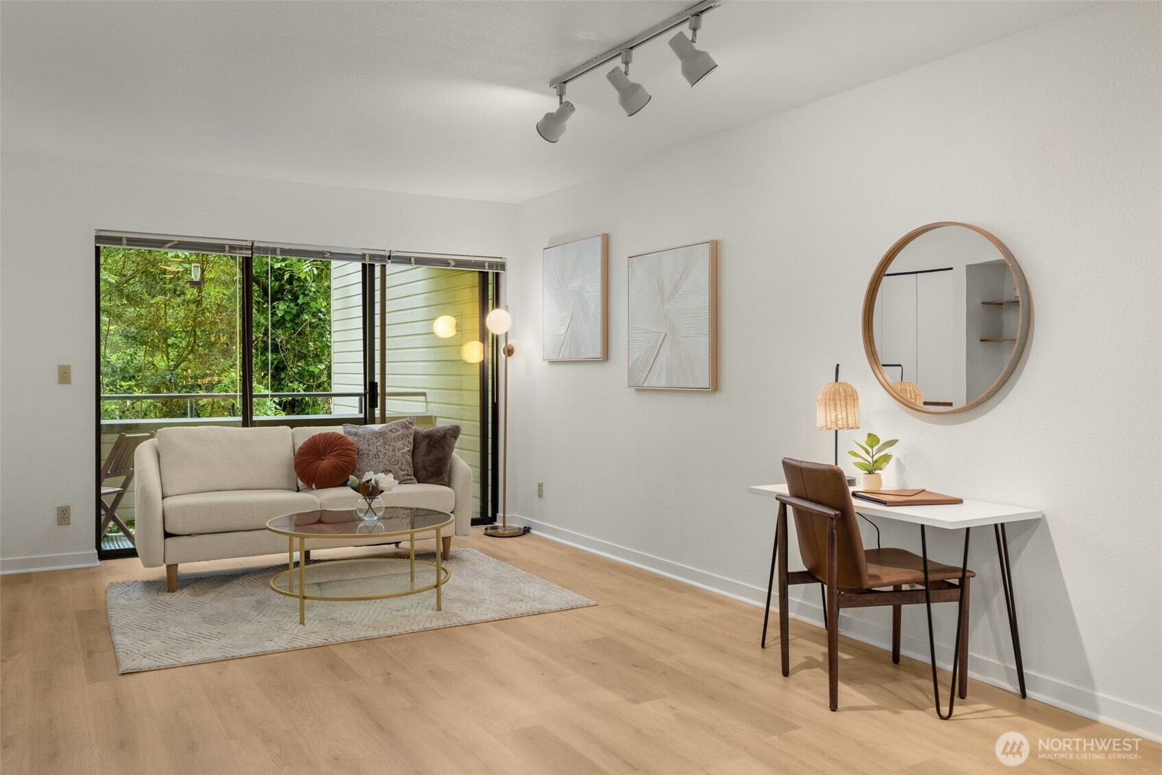 211 Summit Avenue East, Unit S218 Seattle, WA 98102 - Photo 8 of 19 a living room with furniture and a large window