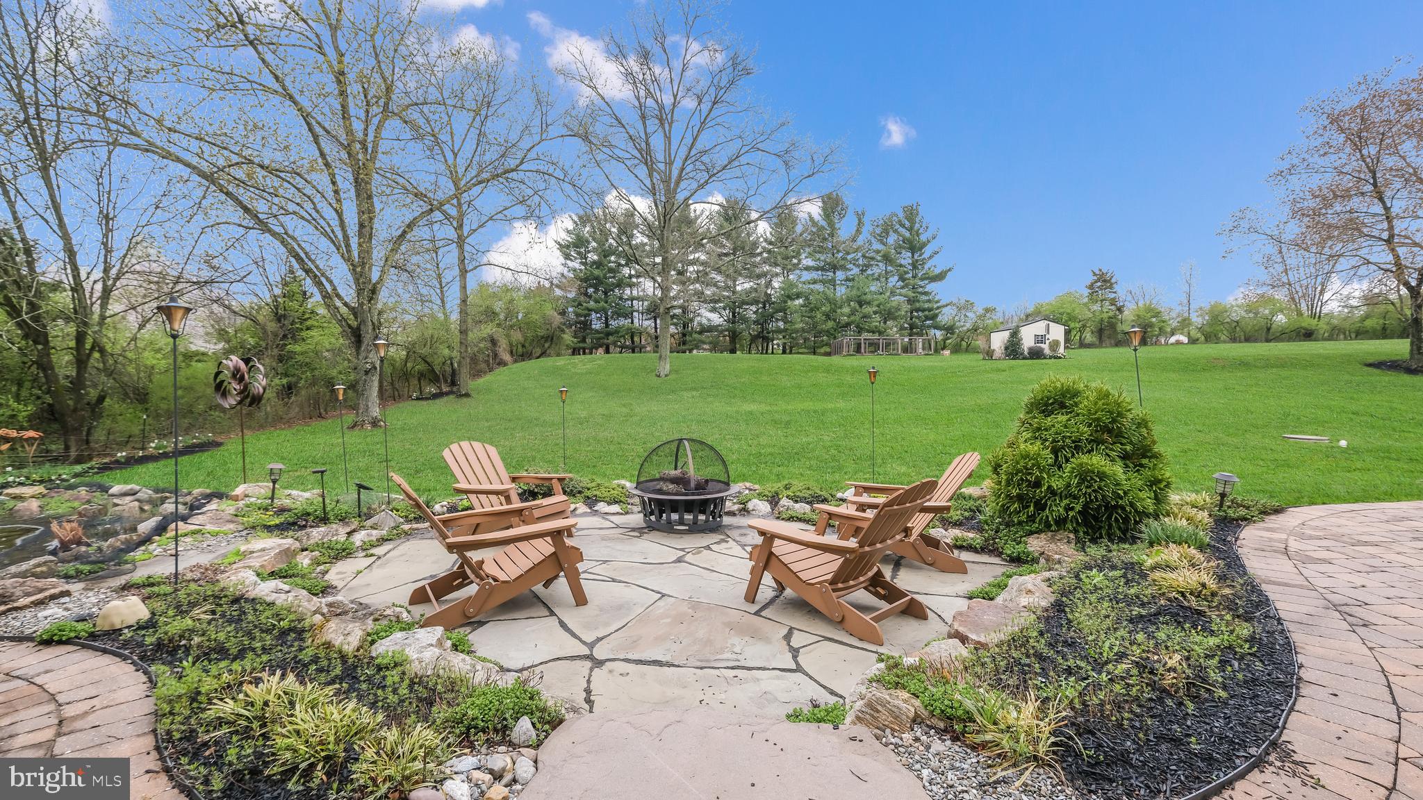 815 Church Road Harleysville, PA 19438 - Photo 19 of 70 BEAUTIFUL BLUE STONE PATIO WITH FRONTGATE FIREPIT