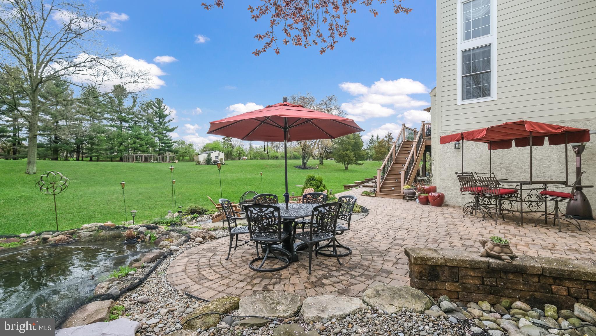 815 Church Road Harleysville, PA 19438 - Photo 21 of 70 WONDERFUL WRAPAROUND BRICK PAVER PATIO