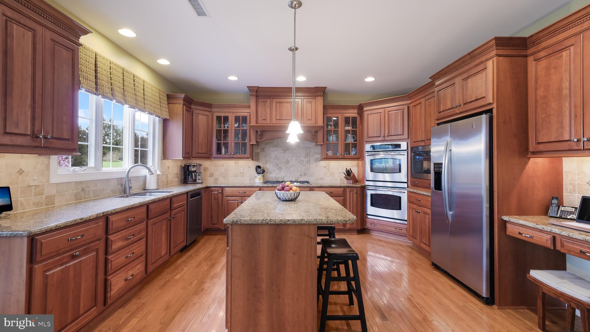 815 Church Road Harleysville, PA 19438 - Photo 40 of 70 CHEF'S KITCHEN WITH CUSTOM CHERRY CABINETRY