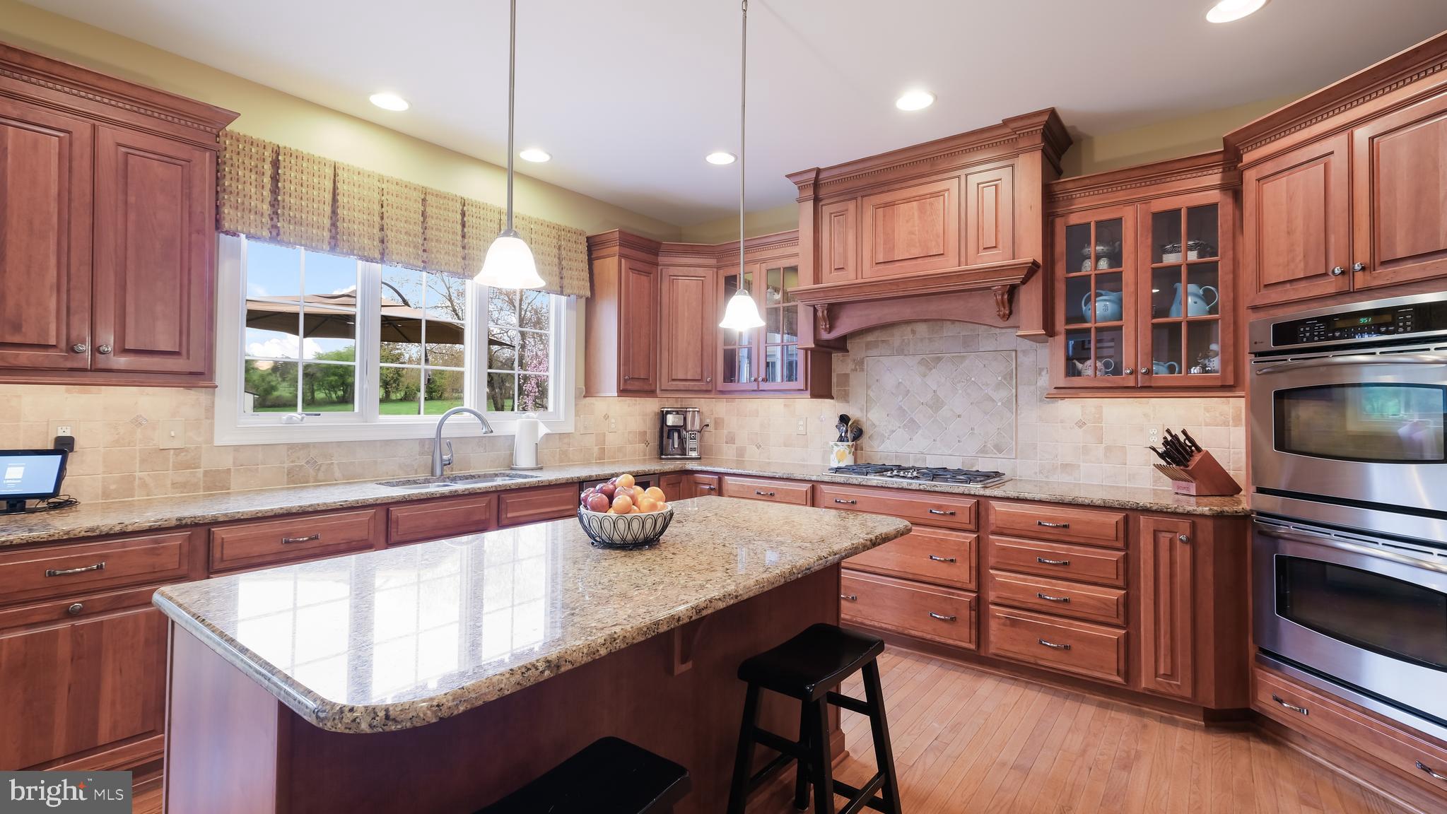 815 Church Road Harleysville, PA 19438 - Photo 42 of 70 TERRIFIC TUSCAN TILE BACKSPLASH. WALK-IN PANTRY