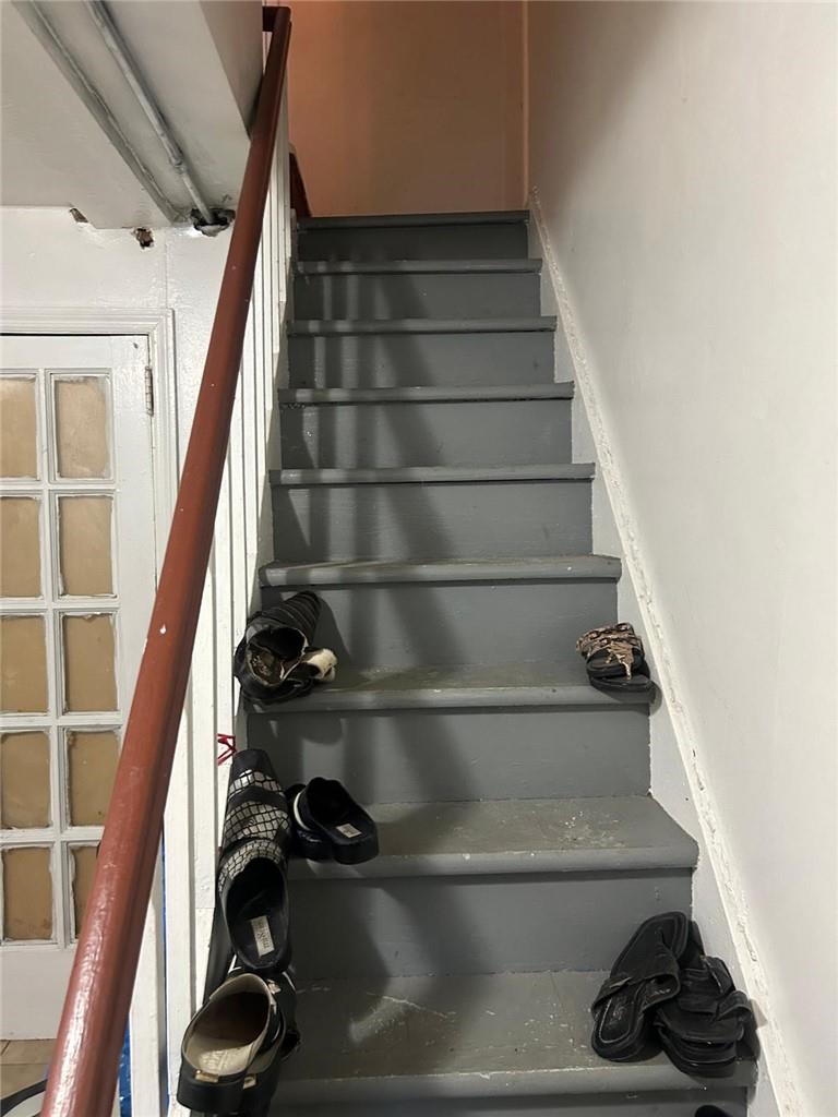 1476 Arnow Avenue Bronx, NY 10469 - Photo 5 of 11 staircase from basement