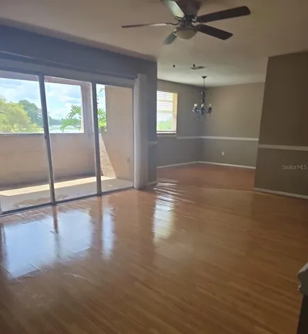 a bathroom with a granite countertop shower and a sink