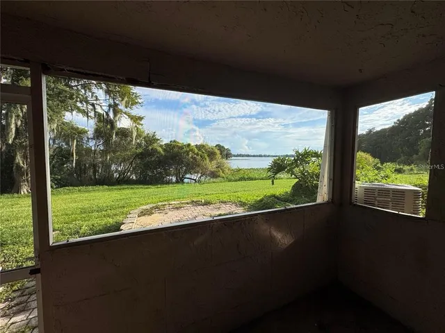 a kitchen with a refrigerator stove and cabinets