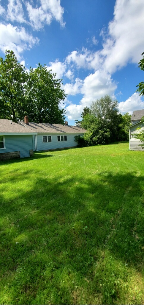 6020 Hickory Street Harvard, IL 60033 - Photo 14 of 17 a view of a garden and basketball court