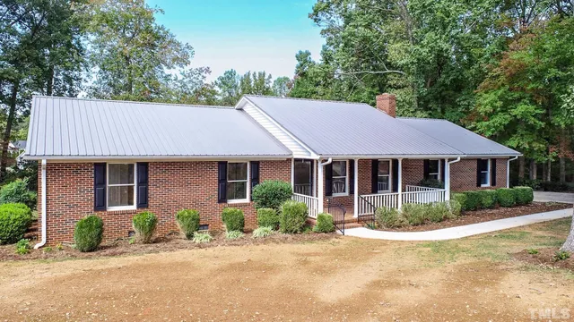front view of a house with a patio