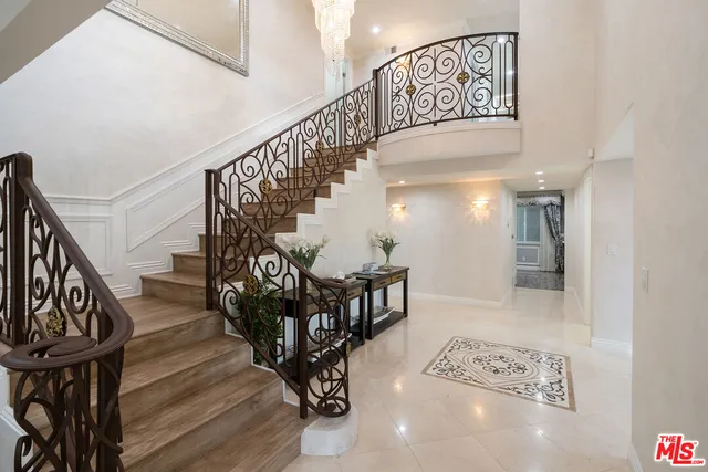 a kitchen with a stove and a refrigerator