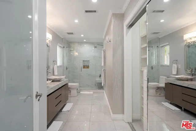 a view of a a dining room with furniture window and wooden floor