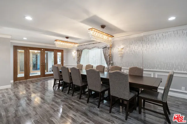 a patio with table and chairs