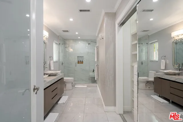 a swimming pool with lawn chairs