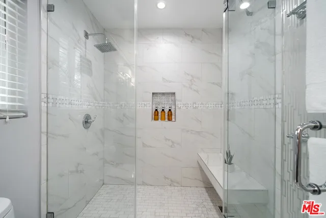 a view of a chairs and table in a room