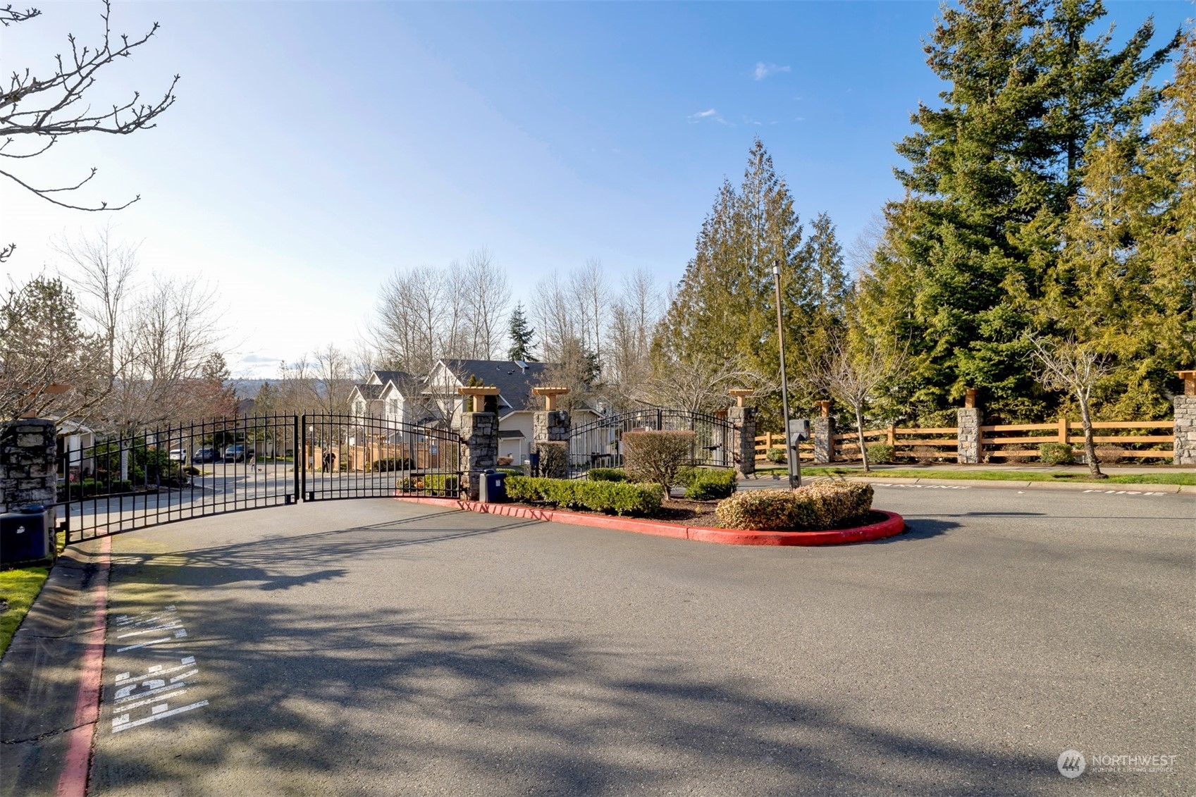 108 South 49th Street, Unit B Renton, WA 98055 - Photo 24 of 24 a view of a street with cars