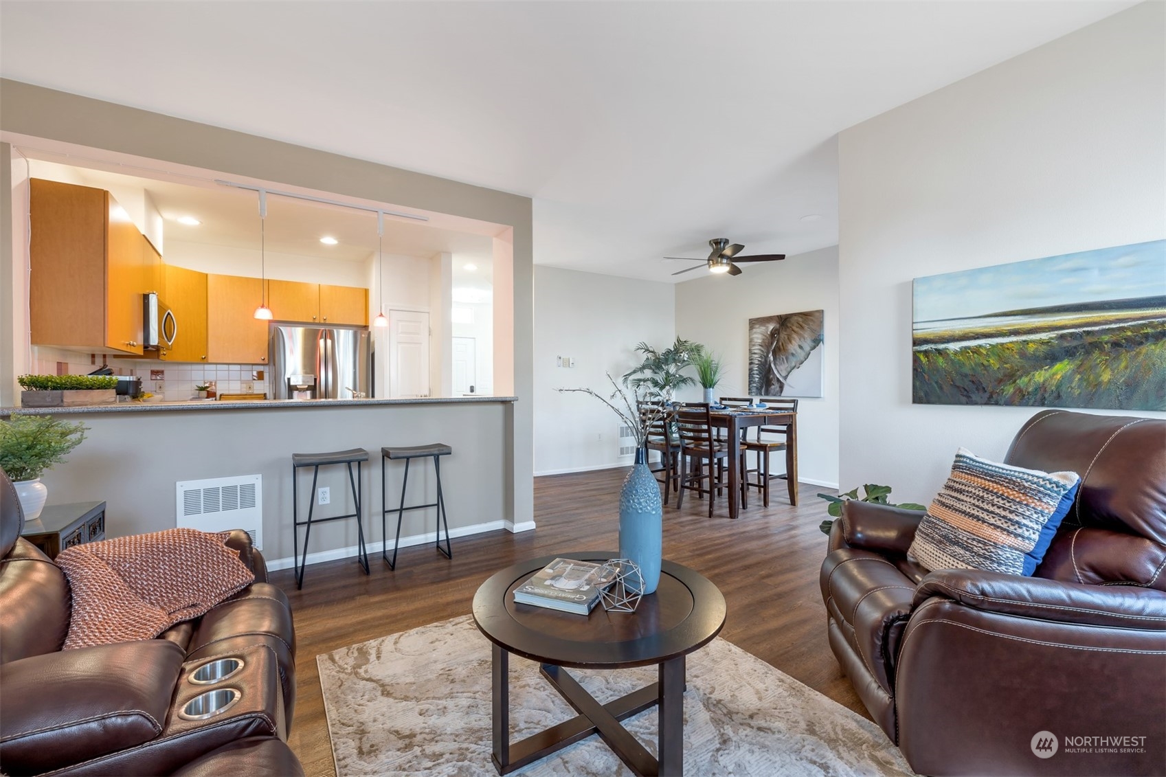 108 South 49th Street, Unit B Renton, WA 98055 - Photo 6 of 24 a living room with furniture and a table
