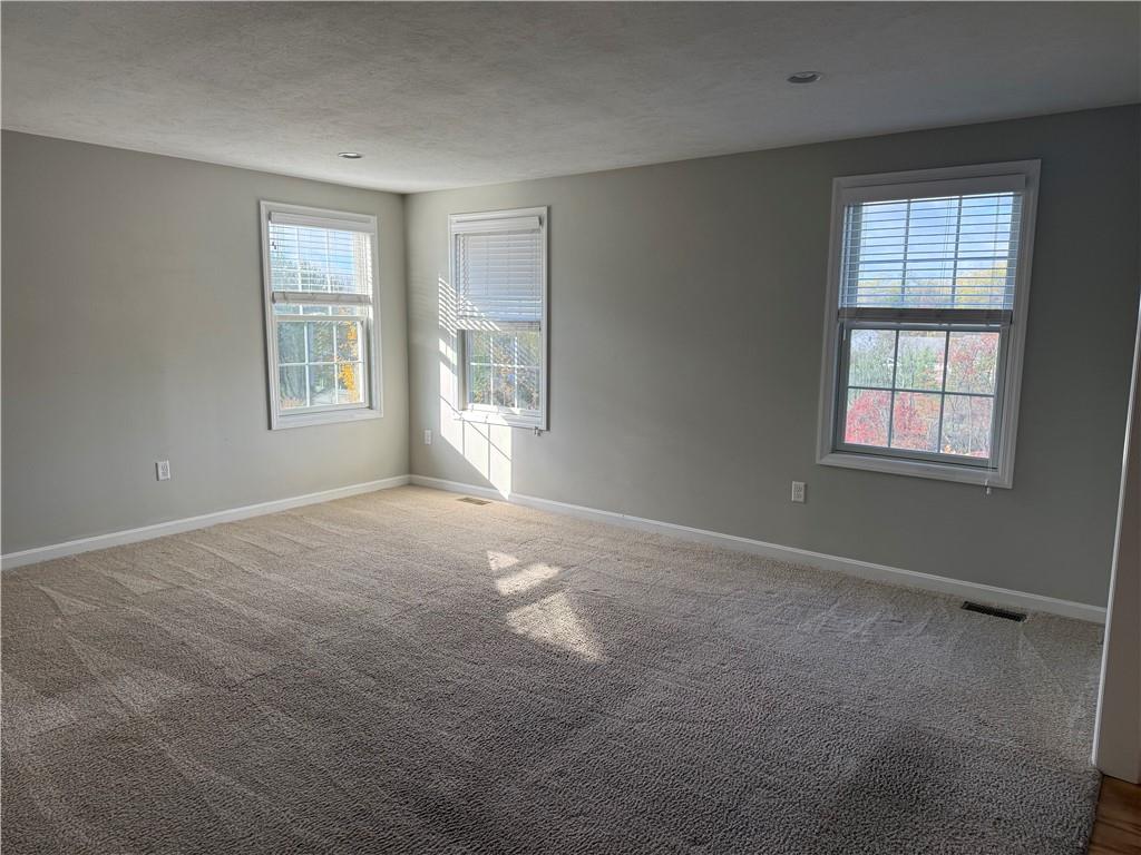 305 Garden Court Gibsonia, PA 15044 - Photo 13 of 28 an empty room with windows