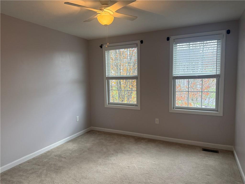 305 Garden Court Gibsonia, PA 15044 - Photo 16 of 28 an empty room with a window