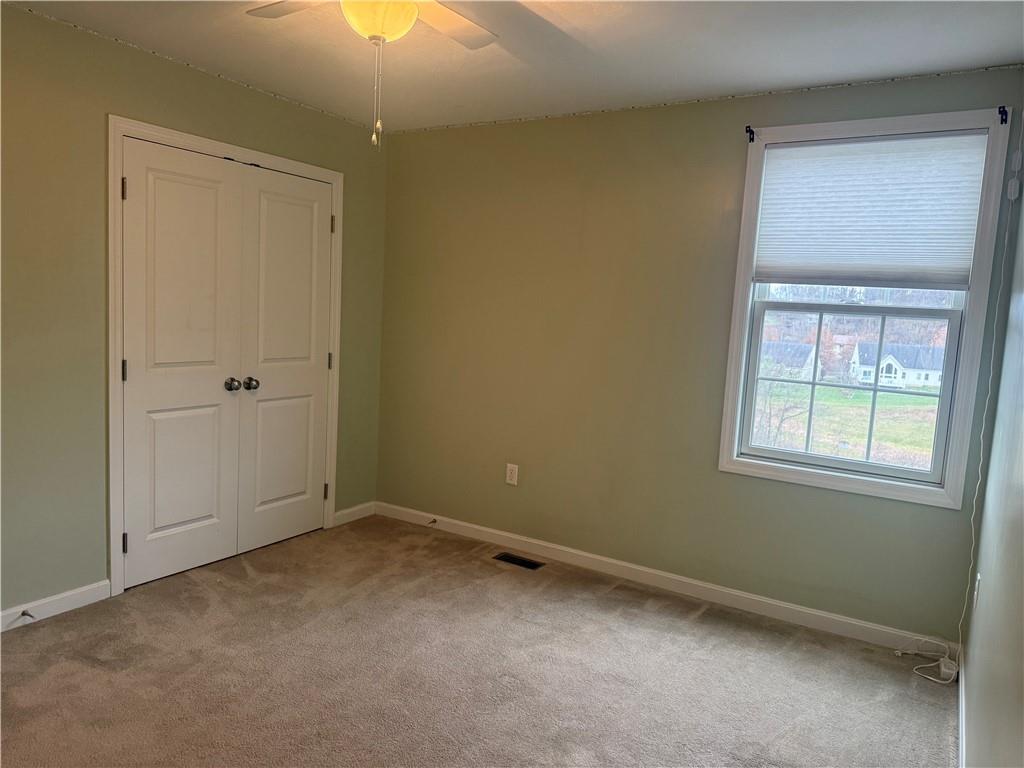 305 Garden Court Gibsonia, PA 15044 - Photo 17 of 28 an empty room with windows