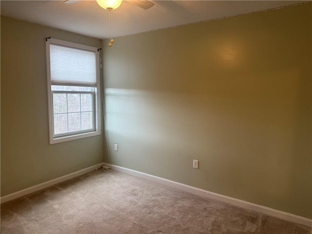 305 Garden Court Gibsonia, PA 15044 - Photo 18 of 28 an empty room with windows