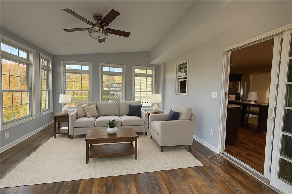 305 Garden Court Gibsonia, PA 15044 - Photo 10 of 28 a living room with furniture and a large window