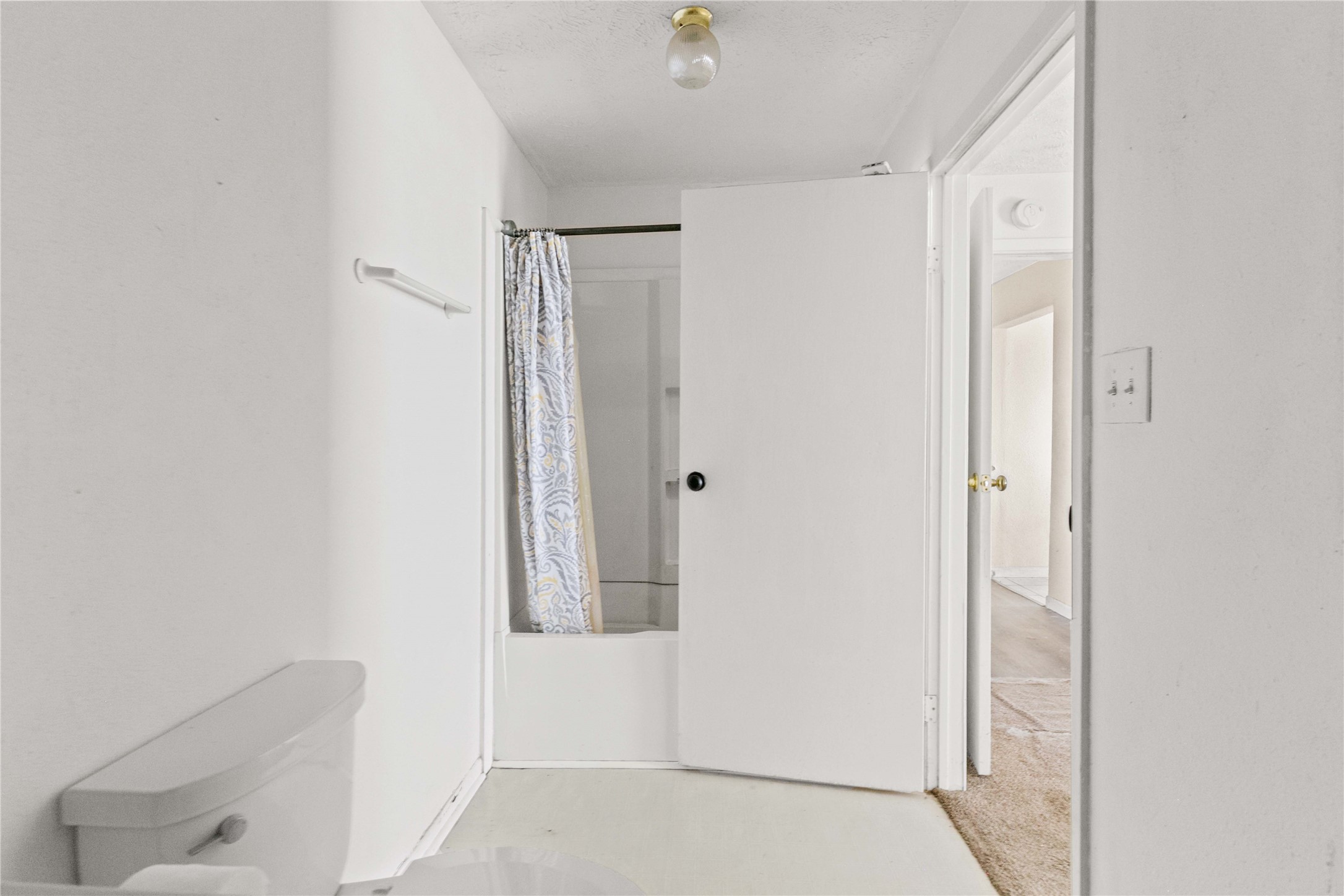 910 Monument Drive Surfside Beach, TX 77541 - Photo 19 of 29 a bathroom with a shower and a sink
