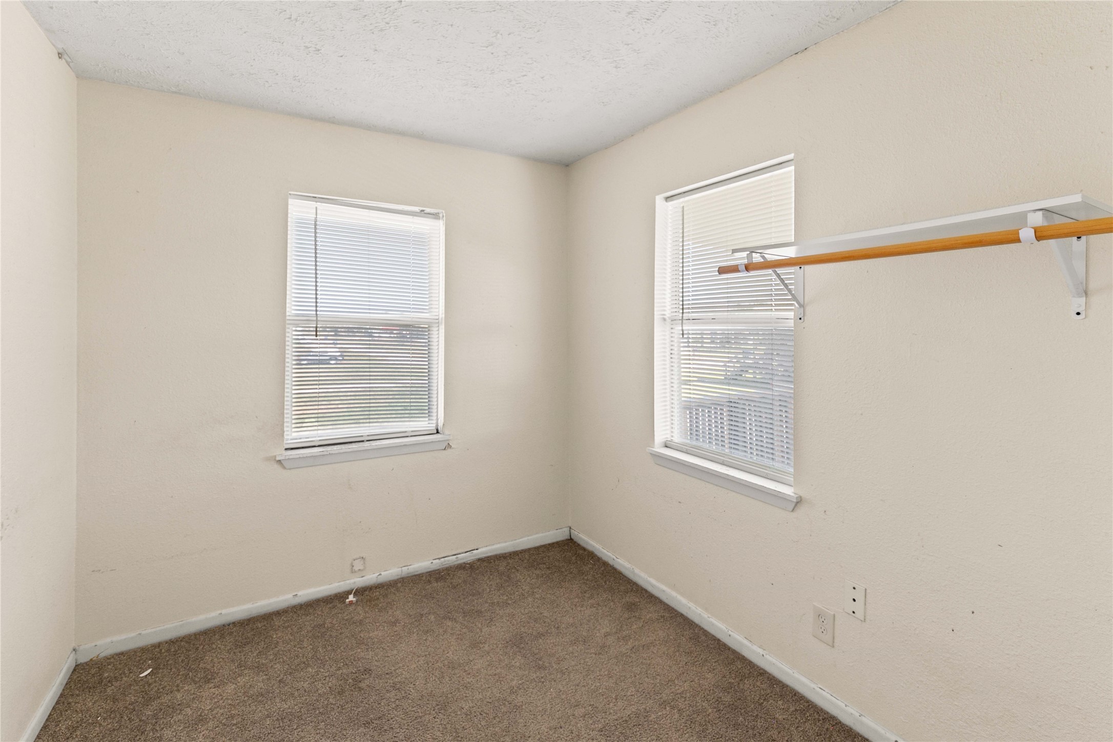 910 Monument Drive Surfside Beach, TX 77541 - Photo 24 of 29 an empty room with a window