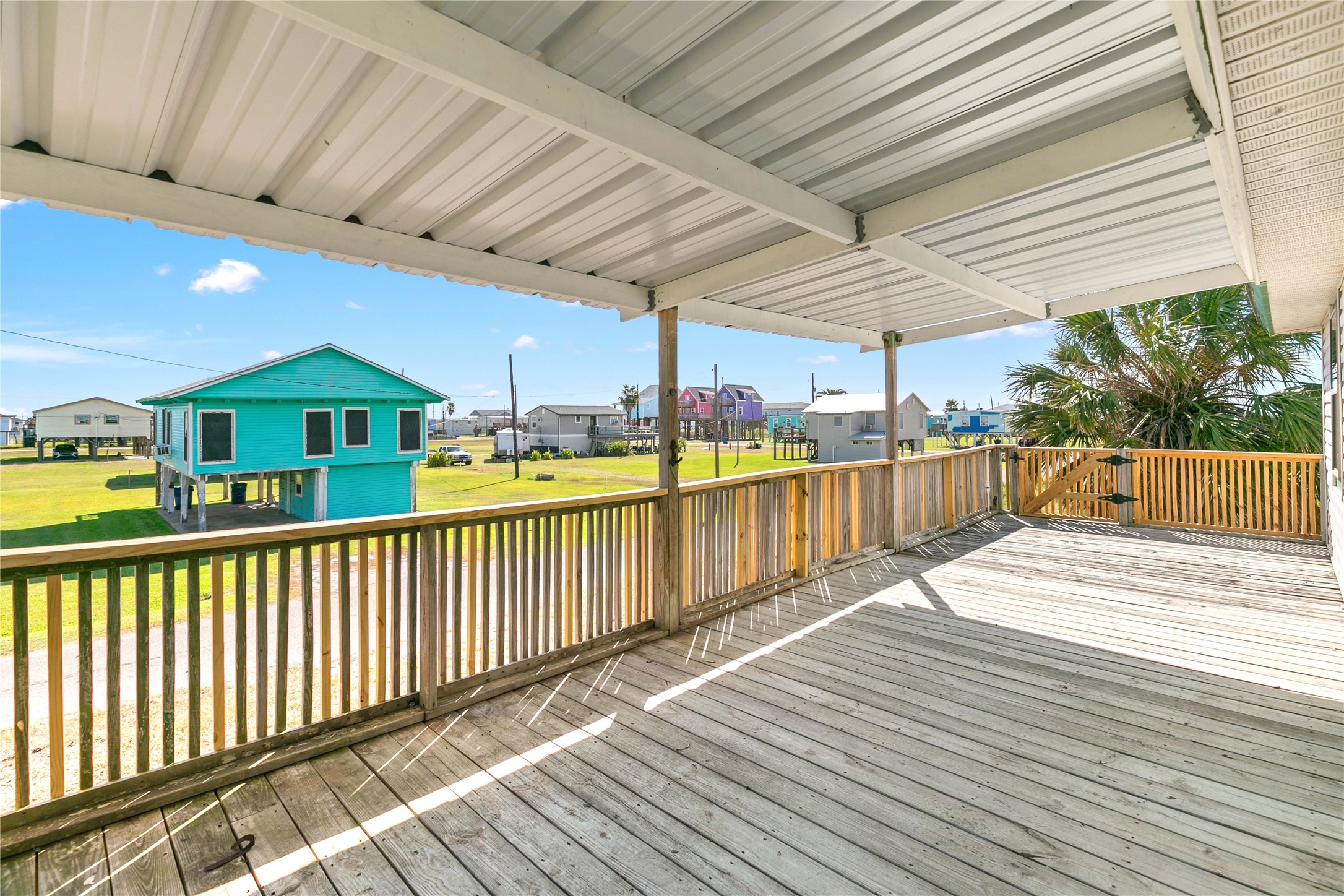 910 Monument Drive Surfside Beach, TX 77541 - Photo 5 of 29 a view of a roof deck