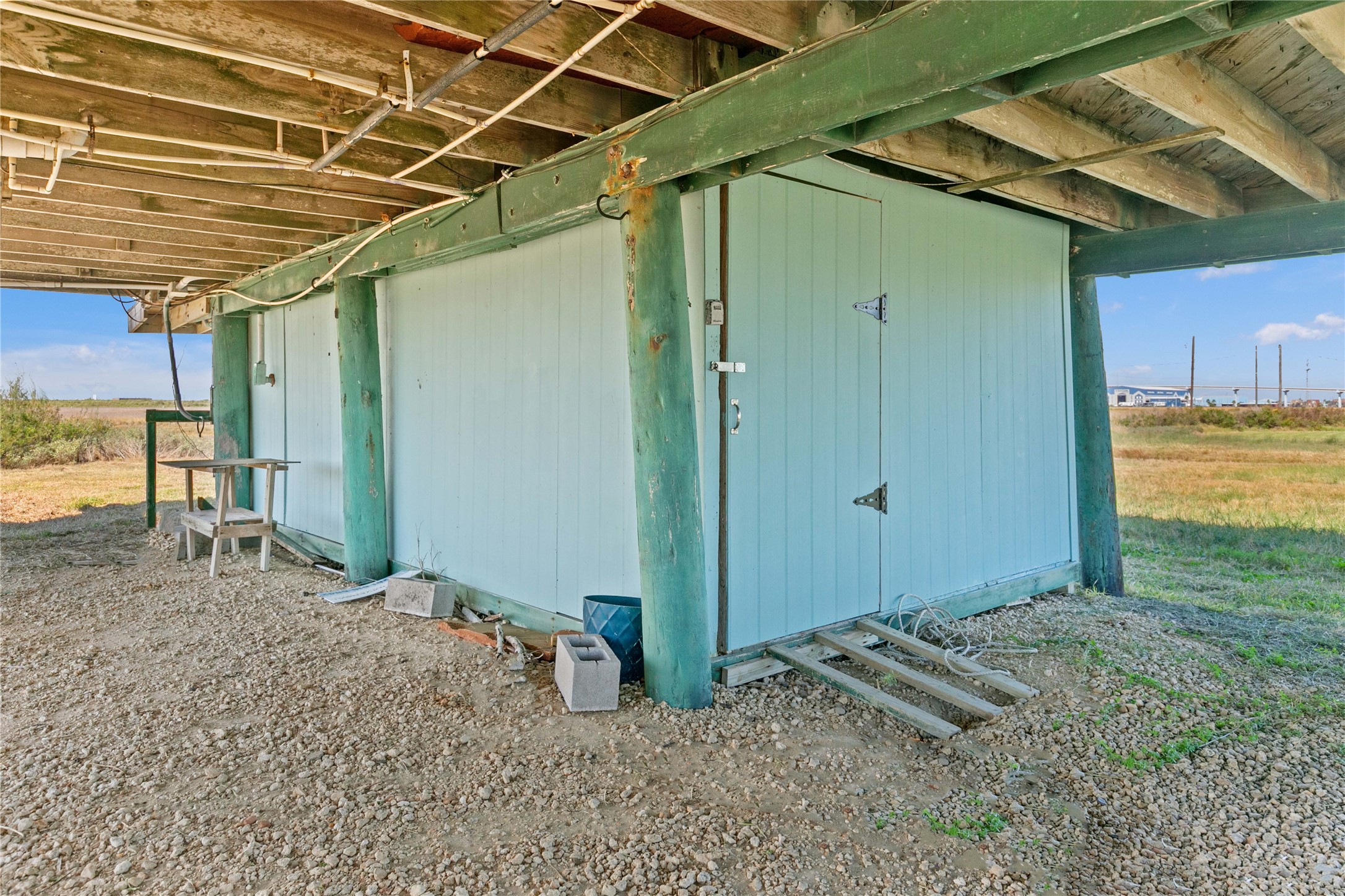 910 Monument Drive Surfside Beach, TX 77541 - Photo 7 of 29 a view of a backyard of the house