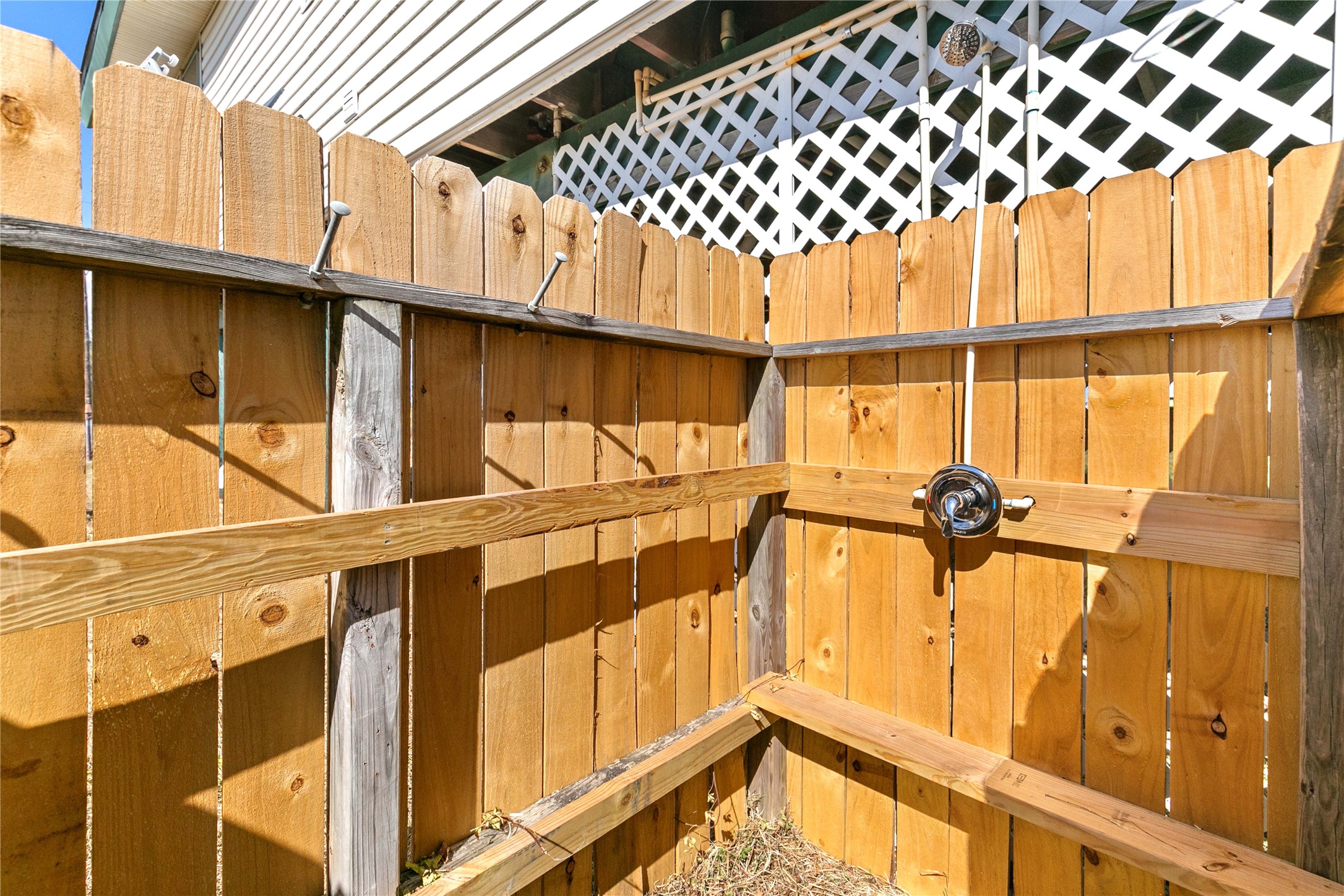 910 Monument Drive Surfside Beach, TX 77541 - Photo 8 of 29 a view of a house with a window