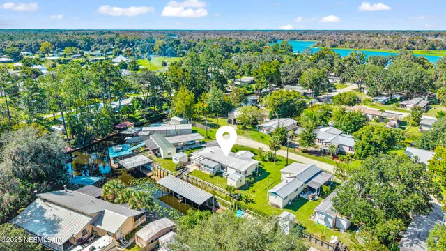 an aerial view of residential house with outdoor space and street view