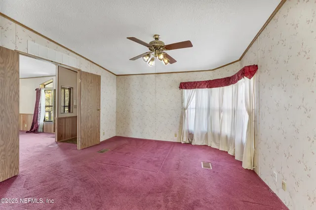 a bathroom with a mirror and a shower