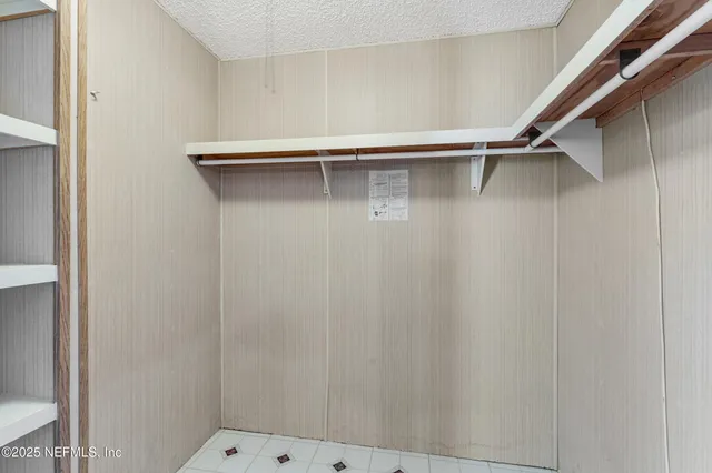 a kitchen with stainless steel appliances a sink stove and refrigerator