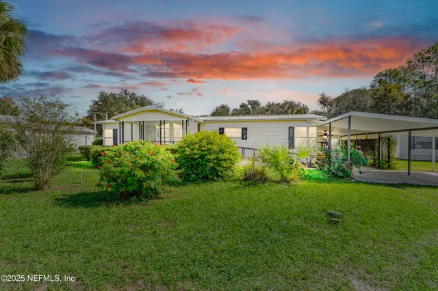 a house view with a garden space
