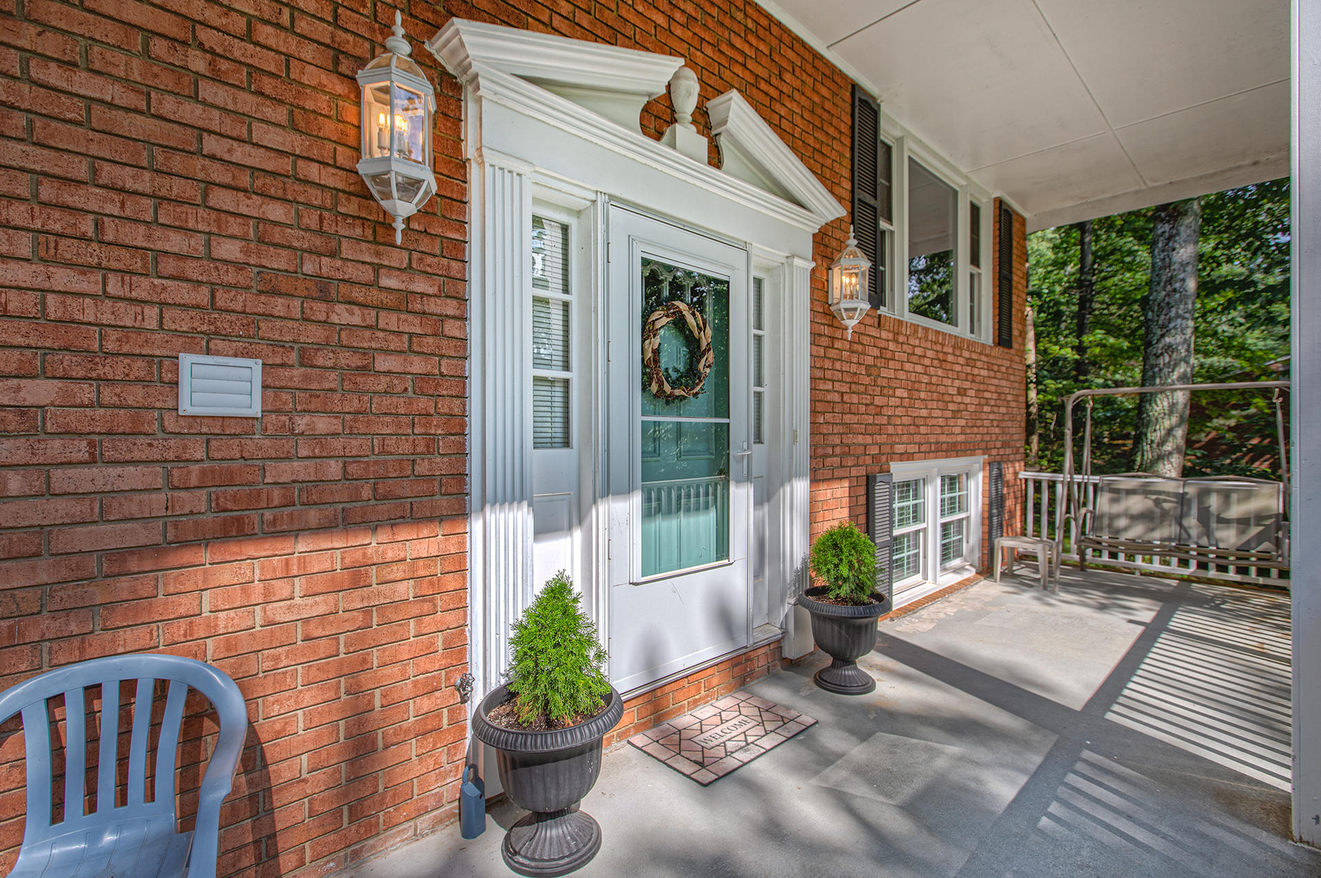 2596 Blue Ridge Springs Road Blue Ridge, VA 24064 - Photo 22 of 32 a view of a porch with furniture