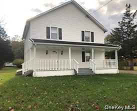 16 Airport Road, Unit 1 Port Jervis, NY 12771 - Photo 1 of 1 a front view of a house with a yard