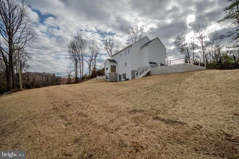 a view of large house with a outdoor space