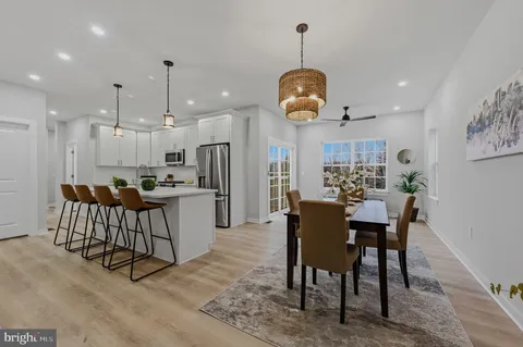 a view of a dining room and livingroom