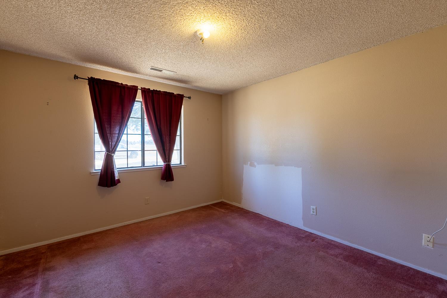 25199 Ave 18 Madera, CA 93638 - Photo 13 of 20 an empty room with windows