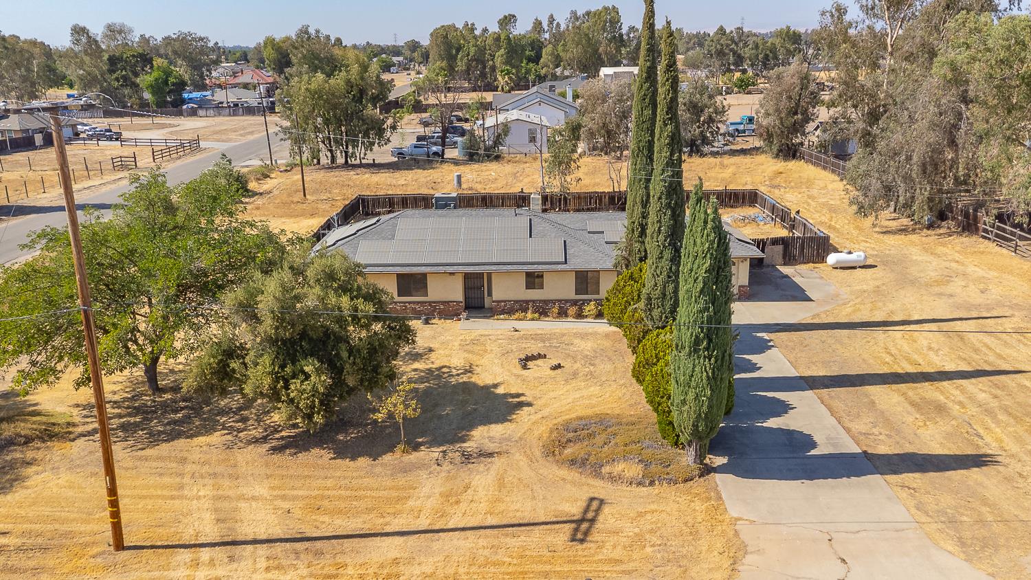 25199 Ave 18 Madera, CA 93638 - Photo 16 of 20 a view of a house with a yard
