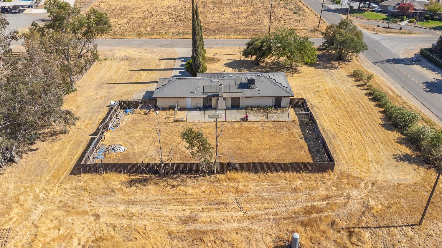 25199 Ave 18 Madera, CA 93638 - Photo 20 of 20 a view of a swimming pool with a lake