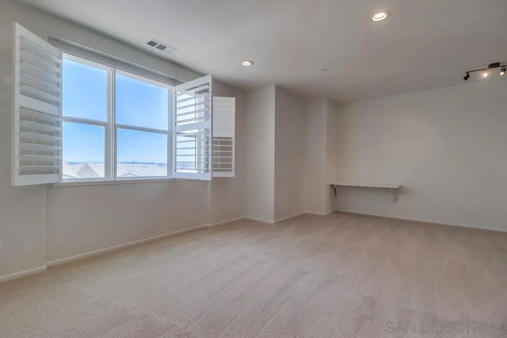 1257 Idanan Road, Unit 3 Chula Vista, CA 91913 - Photo 17 of 40 an empty room with a window