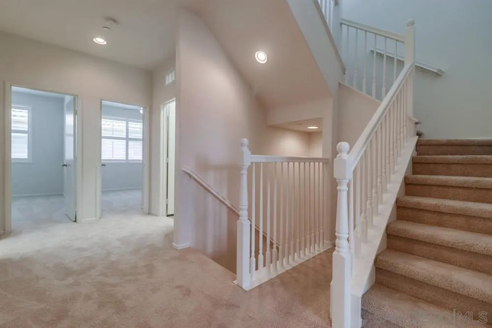 1257 Idanan Road, Unit 3 Chula Vista, CA 91913 - Photo 23 of 40 a view of a hallway with staircase