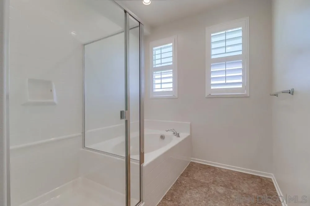 1257 Idanan Road, Unit 3 Chula Vista, CA 91913 - Photo 35 of 40 a bathroom with a bathtub and a shower