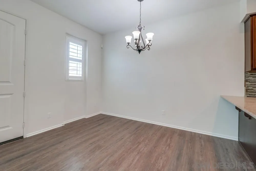 1257 Idanan Road, Unit 3 Chula Vista, CA 91913 - Photo 7 of 40 a view of a chandelier in a room