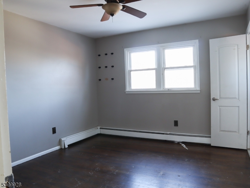 167 Marne Road Hopatcong, NJ 07843 - Photo 11 of 16 an empty room with a window